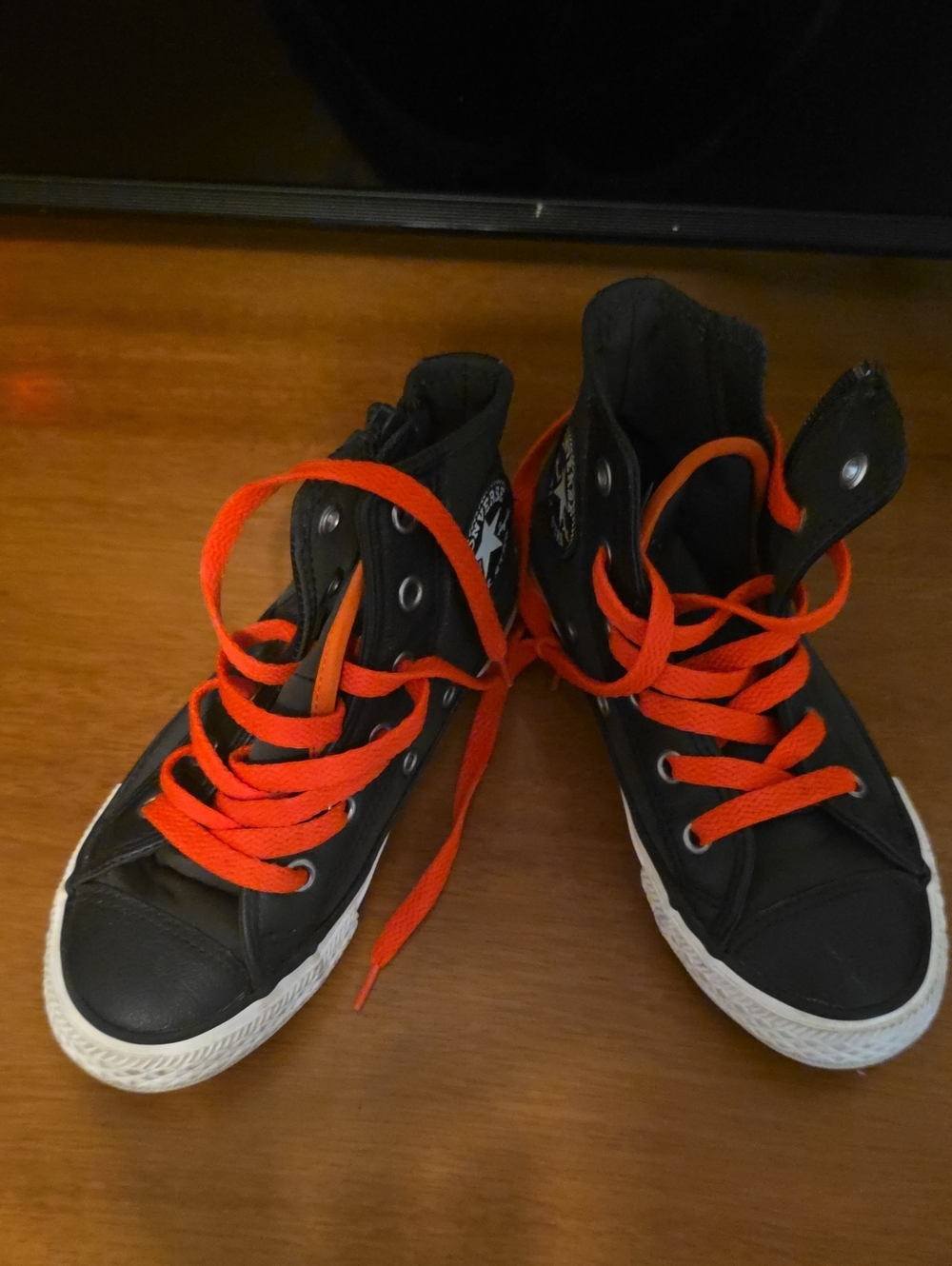 Converse Kids Black High-Top Sneakers with Bright Orange Laces